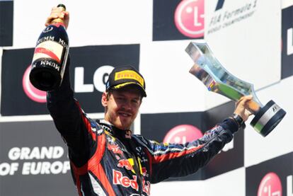 Sebastian Vettel celebrates on the podium after winning the European Grand Prix in Valencia.