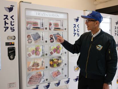 Konomu Kubo, a spokesperson for Kyodo Senpaku Co. explains how whale meat is being sold from a vending machine at the firm's store, Thursday, Jan. 26, 2023, in Yokohama, Japan.