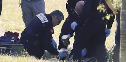 French police at one of ETA's arms caches on Saturday.