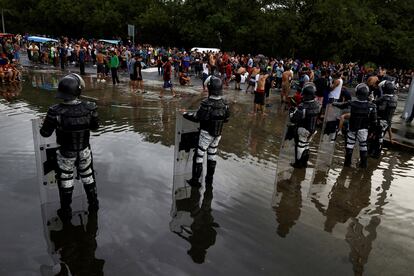 Migrants protest as they attempt to reach the U.S. border, in Huixtla