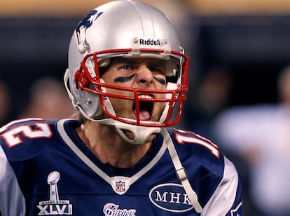 New England Patriots quarterback Tom Brady celebrates his second quarter touchdown pass against the New York Giants in the NFL Super Bowl XLVI football game in Indianapolis, Indiana, February 5, 2012.