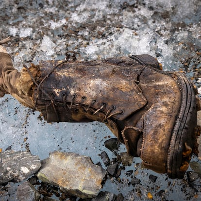 In this photo provided by National Geographic on Friday, Oct. 11, 2024, a view of a sock embroidered with "A.C. Irvine", along with a boot, discovered on the Central Rongbuk Glacier below the North Face of Mount Everest by a team led by Jimmy Chin. (Jimmy Chin/National Geographic via AP)