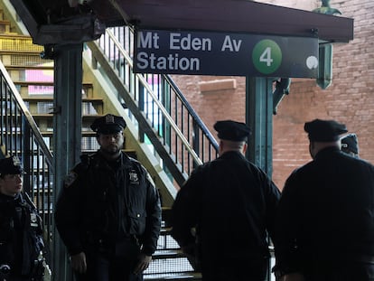 Police officers investigate a shooting at a subway station in the Bronx on February 12.