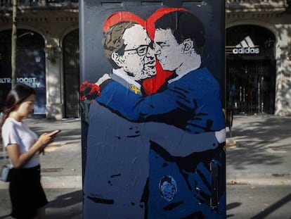 Una pintada sobre el encuentro del presidente de la Generalitat, Quim Torra, y el presidente del Gobierno, Pedro Sánchez. 