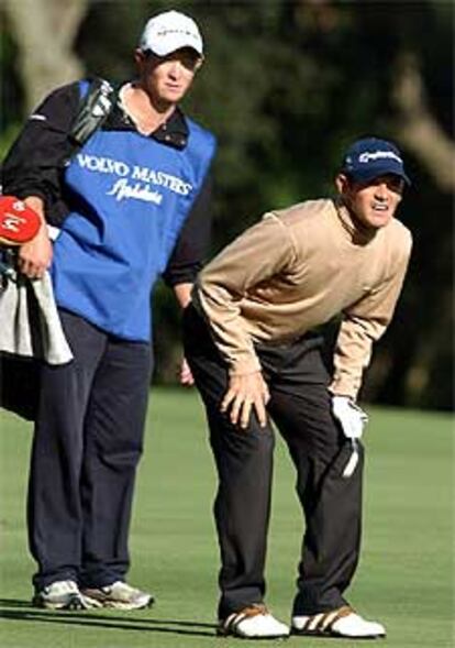 Carlos Rodiles y su <i>caddie</i><b>.</b>