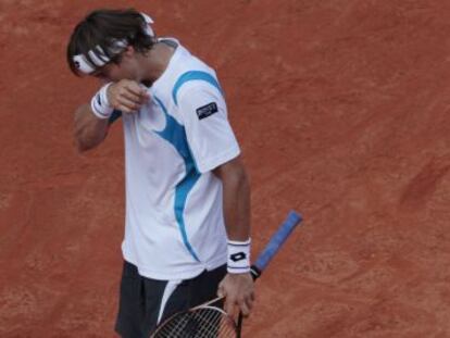 Ferrer se lamenta durante el partido.