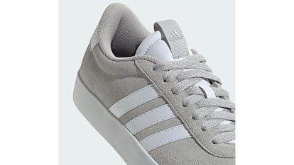Adidas sneakers on white background.