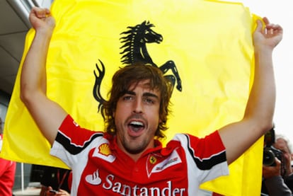 Fernando Alonso celebrates his first win of the season at Silverstone.