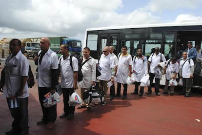 Cuban doctors arrive at the airport in Monrovia, Liberia.