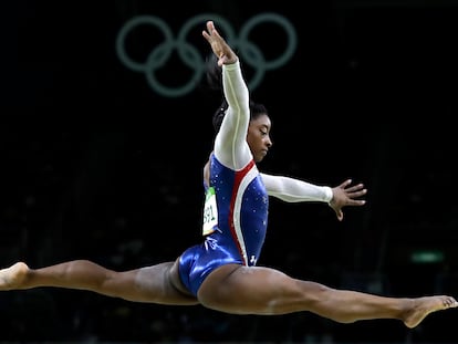 FILE - United States' Simone Biles performs on the balance beam during the artistic gymnastics women's individual all-around final at the 2016 Summer Olympics in Rio de Janeiro, Brazil, Aug. 11, 2016. Biles is returning to competition at the U.S. Classic on Saturday, two years after a bought with "the twisties" forced her to remove herself from several events at the Tokyo Olympics. (AP Photo/Rebecca Blackwell, File)