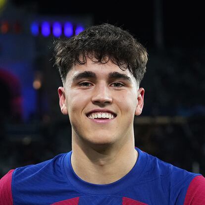BARCELONA, SPAIN - MARCH 12: Pau Cubarsi of FC Barcelona poses for a photo after being awarded as the PlayStation Player of the Match at full-time following the team's victory in the UEFA Champions League 2023/24 round of 16 second leg match between FC Barcelona and SSC Napoli at Estadi Olimpic Lluis Companys on March 12, 2024 in Barcelona, Spain. (Photo by Angel Martinez - UEFA/UEFA via Getty Images)
