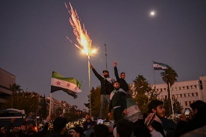 Syrians celebrate the fall of the Bashar al-Assad regime in Umayyad Square in Damascus, on December 13, 2024.