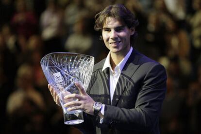 Rafa Nadal poses with his Stefan Elberg Sportsmanship trophy after presented to him during the ATP World Tour Finals