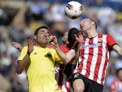 Bruno y Toquero se disputan un bal&oacute;n. 