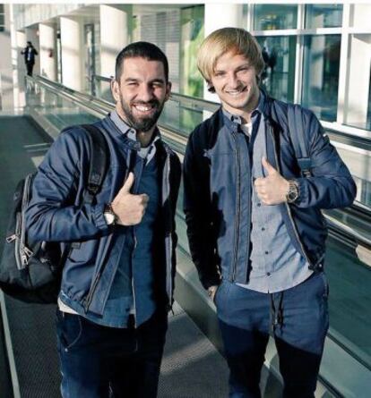 Arda i Rakitic, abans d'agafar el vol.