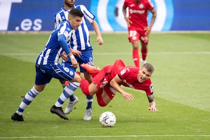 Battaglia y Arambarri, durante el partido.