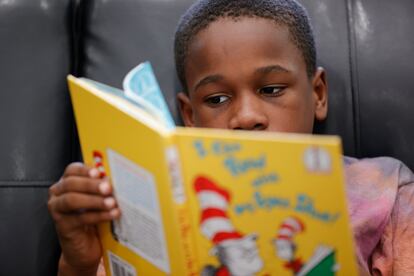 Michael Crowder, 11, reads during an after-school literacy program in Atlanta on Thursday, April 6, 2023