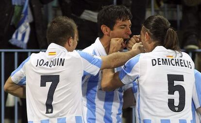 Joaquín, Demichelis y Santa Cruz celebran un gol.