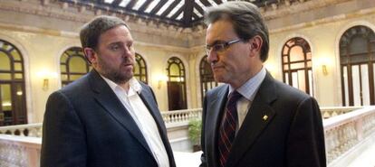 El presidente de la Generalitat de Catalunya, Artur Mas, junto a Oriol Junqueras, en el Parlament.