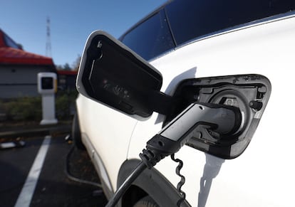 An electric vehicle at a charging station