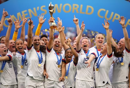 Carli Lloyd lifts the trophy as USA celebrate victory during the 2019 FIFA Women's World Cup final against the Netherlands at Stade de Lyon on July 07, 2019 in Lyon, France. 