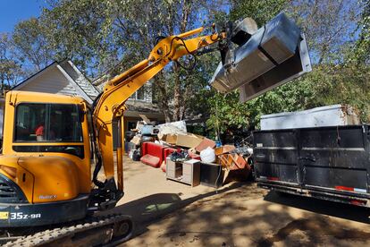 Debris clearing efforts are underway in Swannanoa, North Carolina, following Hurricane Helene.