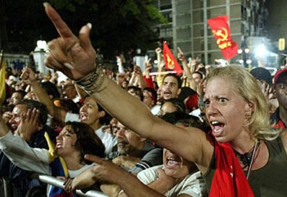 Partidarios de Hugo Chávez, ayer, durante un mitin del presidente venezolano en Caracas.