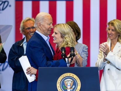 US President Joe Biden (C-L), hugs Kerry Kennedy (C-R) after she and other Kennedy family members endorsed him for president at the Martin Luther King Recreation Center in Philadelphia, April 18, 2024.