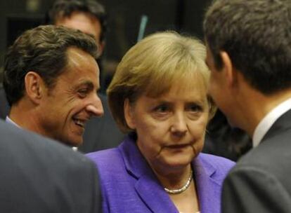 Sarkozy, Merkel y Zapatero, a su llegada a la Cumbre del Consejo Europeo.