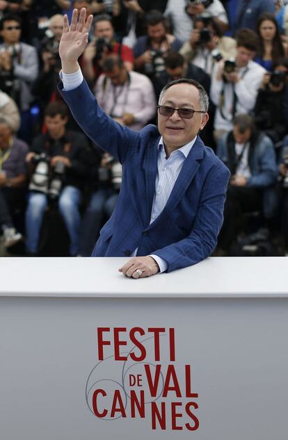 Johnnie To, el director de cine de "Blind Detective" a su llegada al photocall.