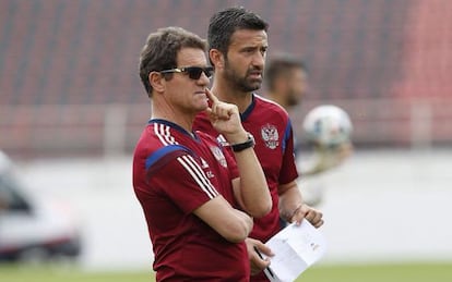 Capello, con Panucci en un entrenamiento de Rusia.