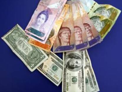 En Venezuela rige desde 2003 un sistema de control de cambios que impide el libre acceso a la divisa extranjera. El Estado monopoliza la distribución y asignación de esas divisas. EFE/Archivo