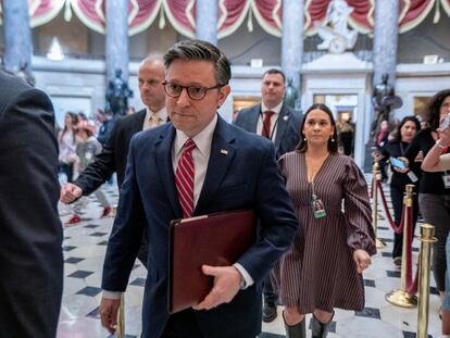 US Speaker of the House Mike Johnson (Front) walks through Statuary Hall to the House floor to vote on the USD 1.2 trillion funding package in the US Capitol in Washington, DC, March 22, 2024.