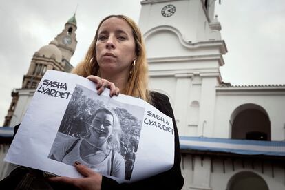 Grisel Llyardet holds a poster with the photo of her sister Sasha, detained as part of the protests that occurred on Wednesday, June 12, 2024.