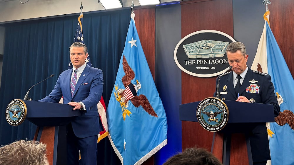 U.S. Defense Secretary Pete Hegseth and Chairman of the Joint Chiefs of Staff Air Force General Dan Caine, speak during a press conference at the Pentagon in Arlington, Virginia, U.S., June 26, 2025. REUTERS/Idrees Ali