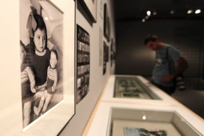 A man observes part of the exhibition 'La maleta mexicana'.