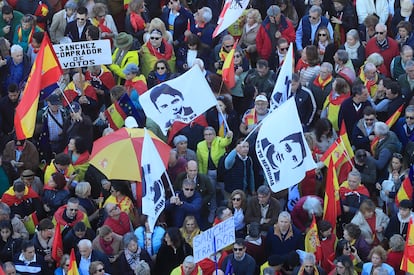 Several protesters waved banners with the image of Miguel Angel Blanco, a lawmaker assassinated by ETA in 1997. 