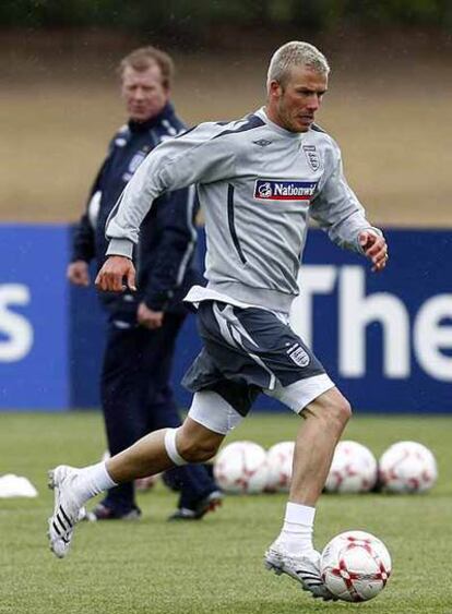 Beckham y McClaren, en un entrenamiento.