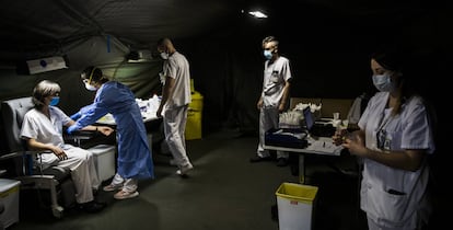 A field hospital in the Spanish region of Asturias tests health workers for coronavirus.