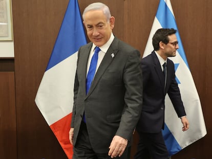 Israeli Prime Minister Benjamin Netanyahu and French Foreign Minister Stephane Sejourne take seats as they meet in Jerusalem on February 5, 2024.