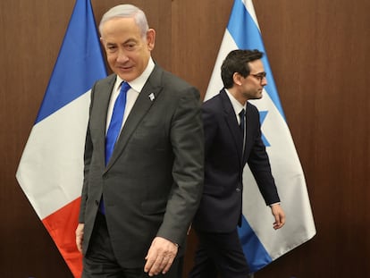 Israeli Prime Minister Benjamin Netanyahu and French Foreign Minister Stephane Sejourne take seats as they meet in Jerusalem on February 5, 2024.