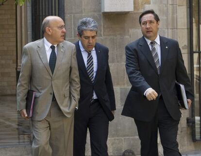 (De i a d) Los consejeros de Salud, Boi Ruiz; de Presidencia, Francesc Homs, y de Agricultura, Josep Maria Pelegrí, respectivamente.