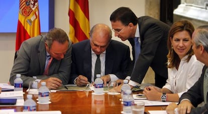 Fabra, Fern&aacute;ndez D&iacute;az y Castellano, este martes, en el Palau de la Generalitat. 