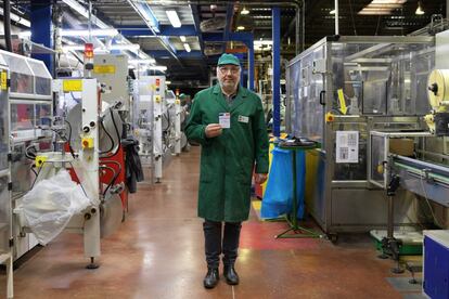 Gerard Cazorla, 59, married with three children, head of a tea-making plant near the southern city of Marseille that used to belong to Unilever and now operates as a cooperative, poses with his voting card on February 9, 2017, inside his Scop-Ti factory in Gemenos.
What should be the priorities of the next French president?
"The president should implement policies that benefit workers and develop the social economy. We've seen this sector growing in size. I want this sector to be developped as an alternative to capitalism which, to my mind, is the big problem today. We should promote the cooperative system, which gives everyone a voice and is more democratic because each voice carries the same weight. One man, one voice. One woman, one voice. That's the alternative to the capitalist system which is killing us." / AFP PHOTO / ANNE-CHRISTINE POUJOULAT / RESTRICTED TO EDITORIAL USE - RESTRICTED TO FRENCH ELECTIONS ILLUSTRATION PURPOSE