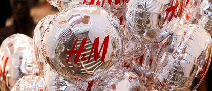 FILE PHOTO: Balloons with the logo of Swedish fashion retailer H&amp;M are pictured at its newly opened store in central Moscow