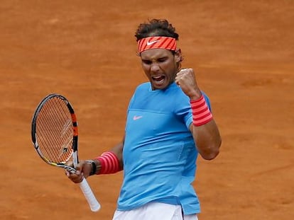 Nadal celebra un punto ante Johnson.