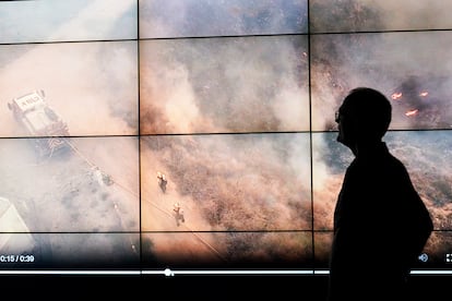 Falco Kuester, a researcher at ALERTCalifornia, a program run by the University of California San Diego, looks at imagery of firefighters at a fire from one of the program's cameras, Monday, Sept. 18, 2023.