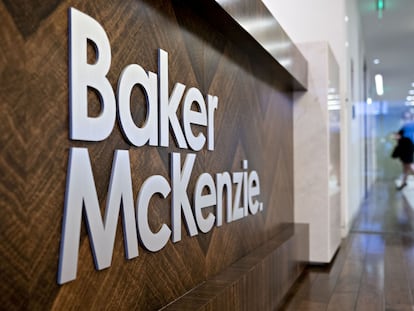 Signage is displayed at the Baker McKenzie office in Washington, D.C., U.S., on Tuesday, Feb. 18, 2020. Hong Kong-based Milton Cheng was elected Baker McKenzie's first Asian-born global chair last September following the sudden death in April of its former leader Paul Rawlinson. Photographer: Andrew Harrer/Bloomberg