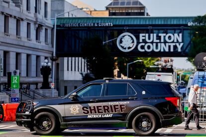 Enhanced security measures are implemented outside the Fulton County Courthouse and Justice Center ahead of a possible grand jury indictment against former US President Donald Trump for 2020 election interference in Atlanta, Georgia, USA