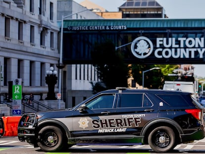 Enhanced security measures are implemented outside the Fulton County Courthouse ahead of a possible grand jury indictment against former president Donald Trump in Atlanta, Georgia, on Aug. 14 2023.